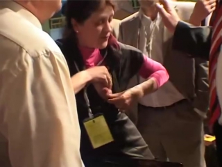 khokhlushka milking herself human milk a woman in protest expresses milk from her breast onto the table at the congress of lawyers of ukraine